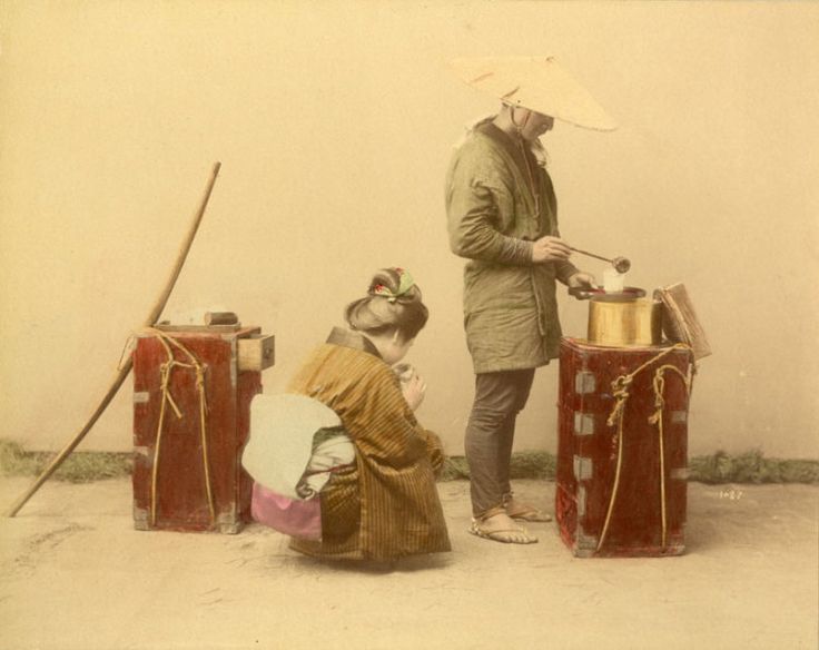 An amazake vendor from the Meiji Period selling to a young woman