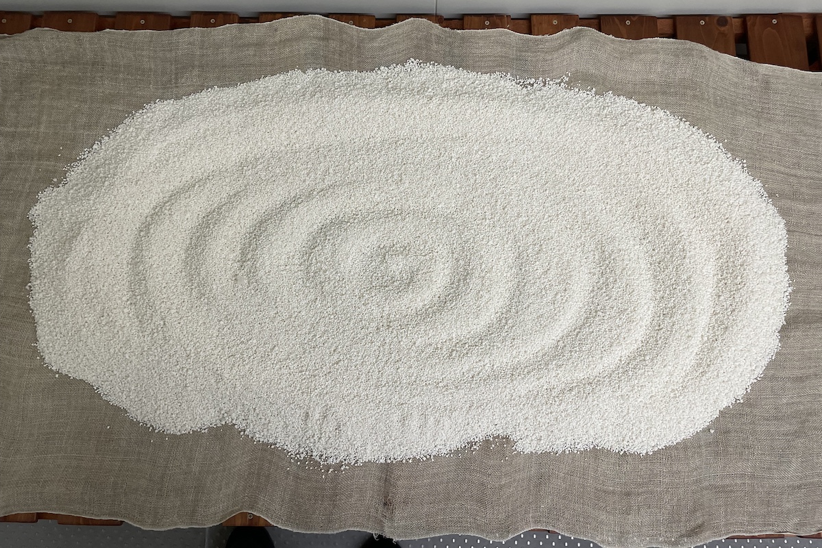 A beautiful Zen garden-like swirl of finished koji drying